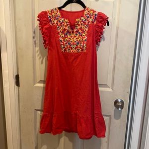 Red embroidered dress